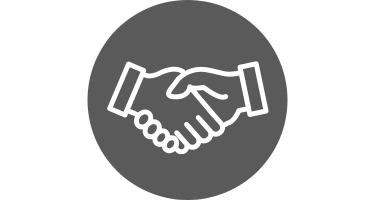 gray circle with outline of two hands shaking