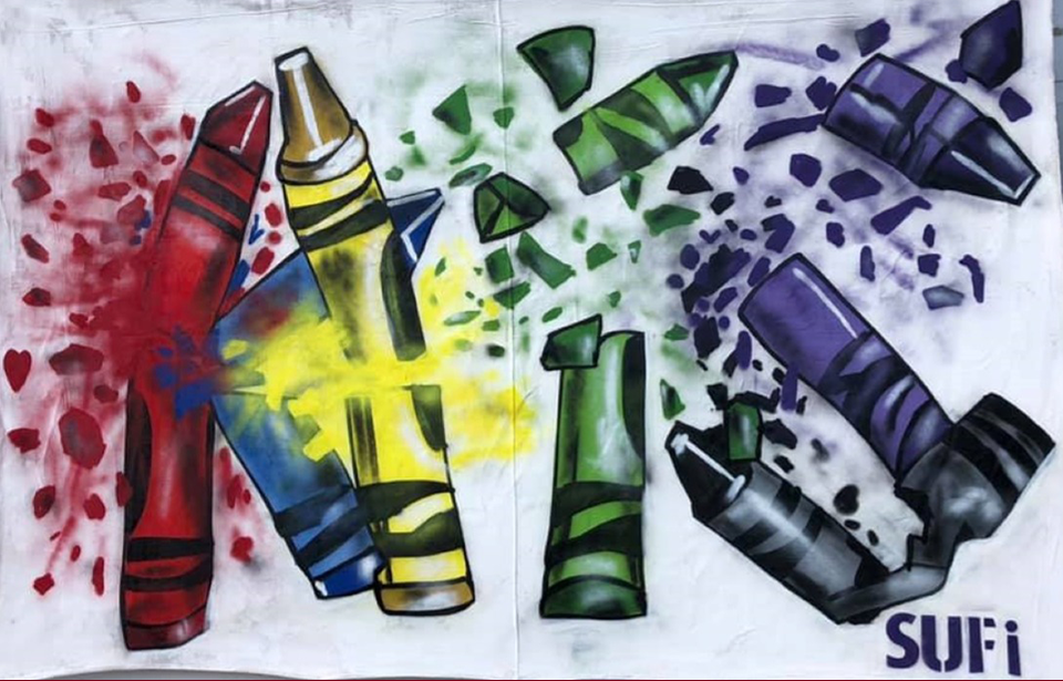 "Lost Youth" depicts crayons shattered by a bullt