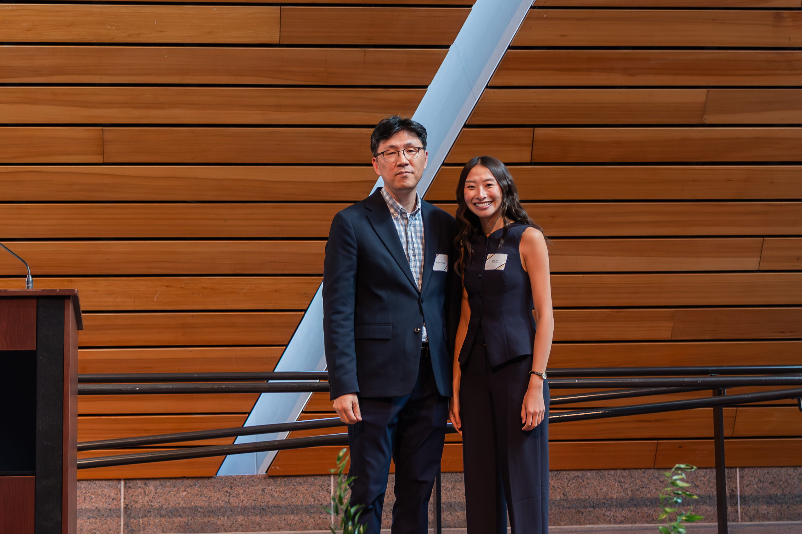 Division of Biomaterials announcer and awardee pose for a photo
