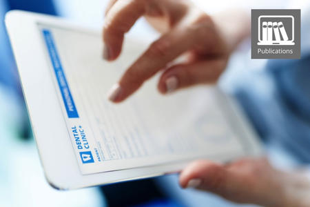 close up image of a person holding an tablet
