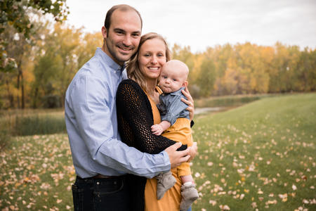 Amy Full with her spouse and child