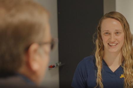 A student speaks with a donor