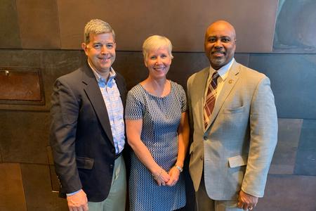 Stephen Bejarano and Elizabeth Rydell Bejarano pose with Dean Mays
