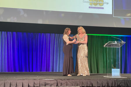 Michelle Arnett receives award at ADEA conference