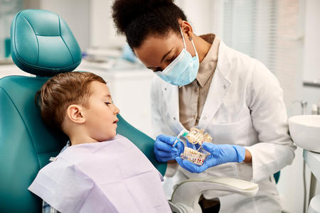 Doctor caring for child patient.