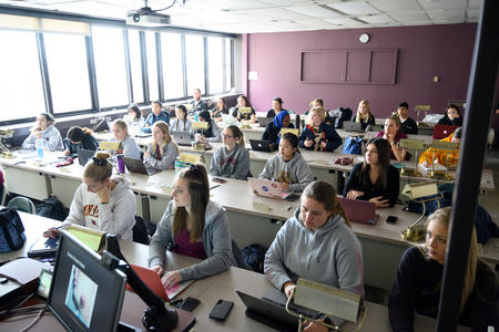 Students sitting in classroom.