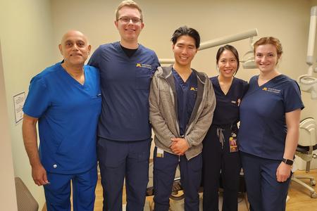 School of Dentistry students pose with People's Center faculty