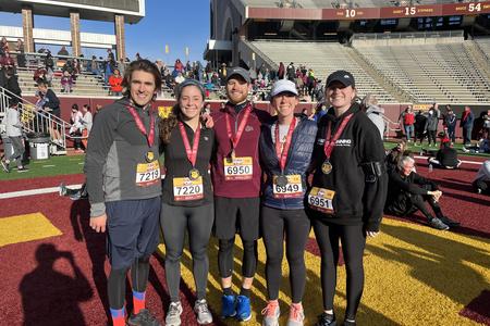 Cole Johnson with friends after a race in Huntington Bank Stadium