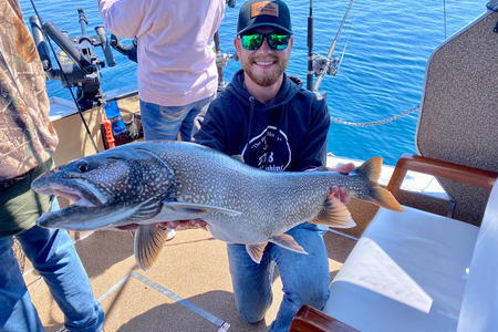 Riley Leslie with fish he caught.