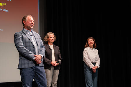 Nixdorf, Artinger and Chew smile and talk onstage