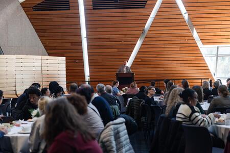Dean Mays addresses faculty and staff at the Winter Celebration
