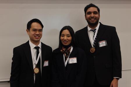 Adhi Suresh Kumar poses with his teammates at the CLARION competition