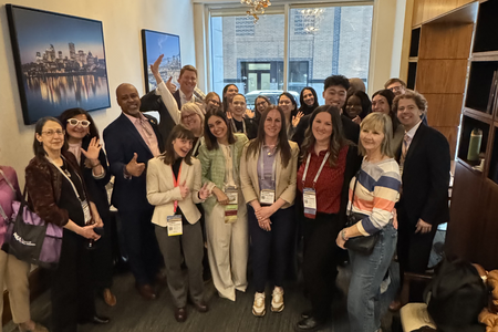 A large group of students, faculty and staff at ADEA