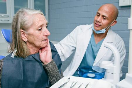 geriatric patient receiving dental care