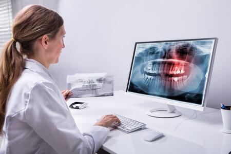 dentist reviewing complex case
