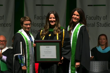 Paulson receives her award onstage