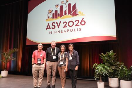 Mansky and Zhang pose with ASV leadership on the ASV stage