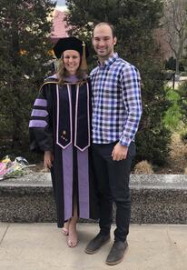 Amy Full and her spouse at graduation