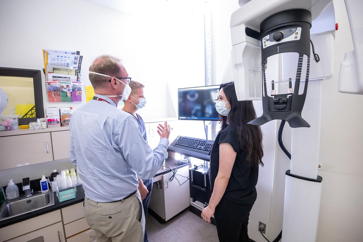 Dr. Noblett shows residents an x-ray
