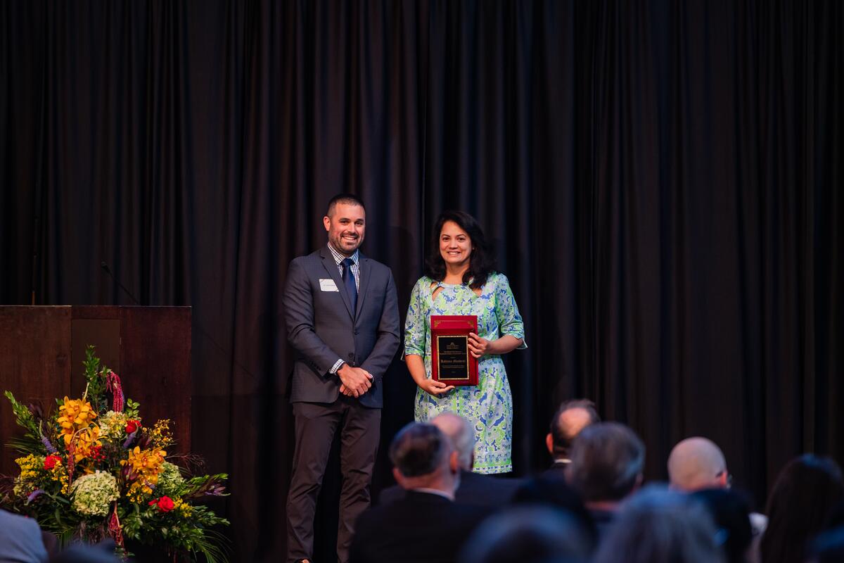 A student receives their award onstage