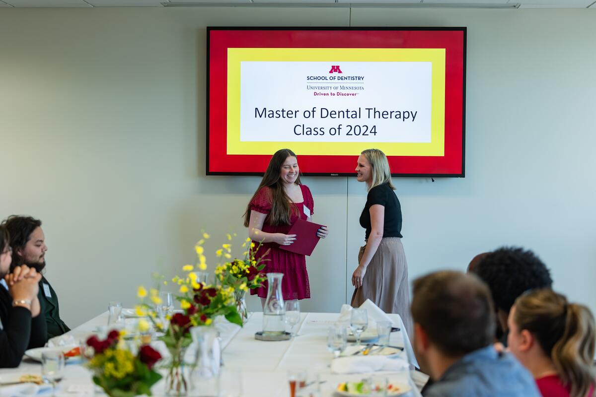 Kaitlyn Niemann receives her award