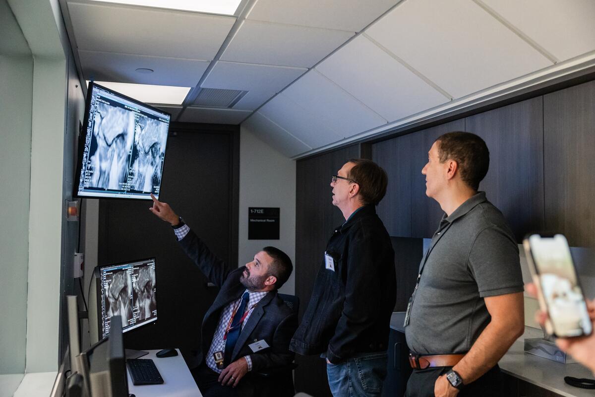Gaalaas demonstrates the capabilities of the dental-dedicated MRI from the control room