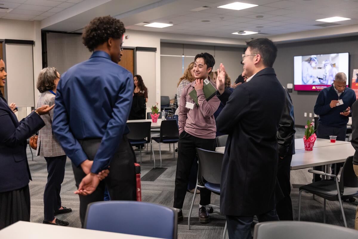 Students, alumni and donors connect at an AAOC event