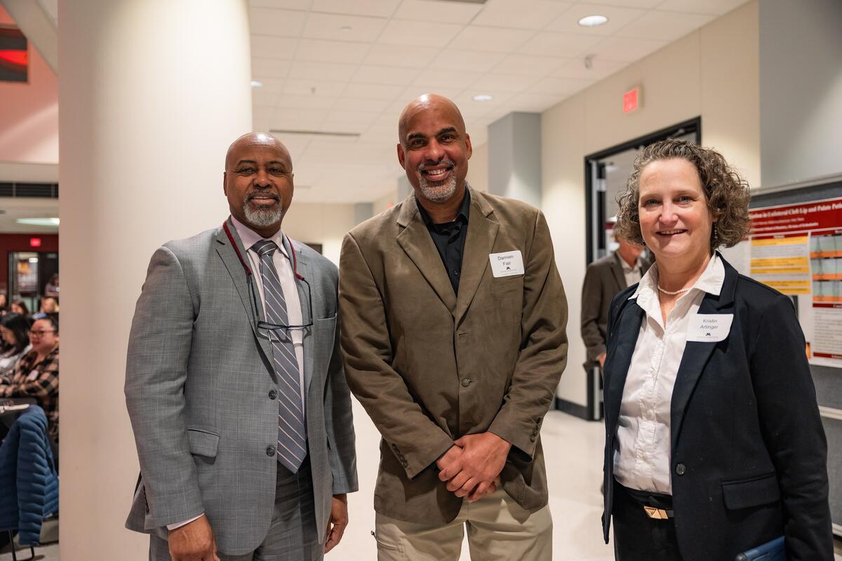 Dean Keith Mays, DDS, MS, PhD, with Damian Fair, PA-C, PhD, and Kristin Artinger, PhD