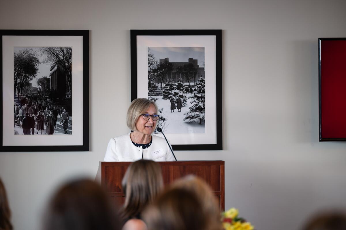 Cyndee Stull provides remarks from behind a podium