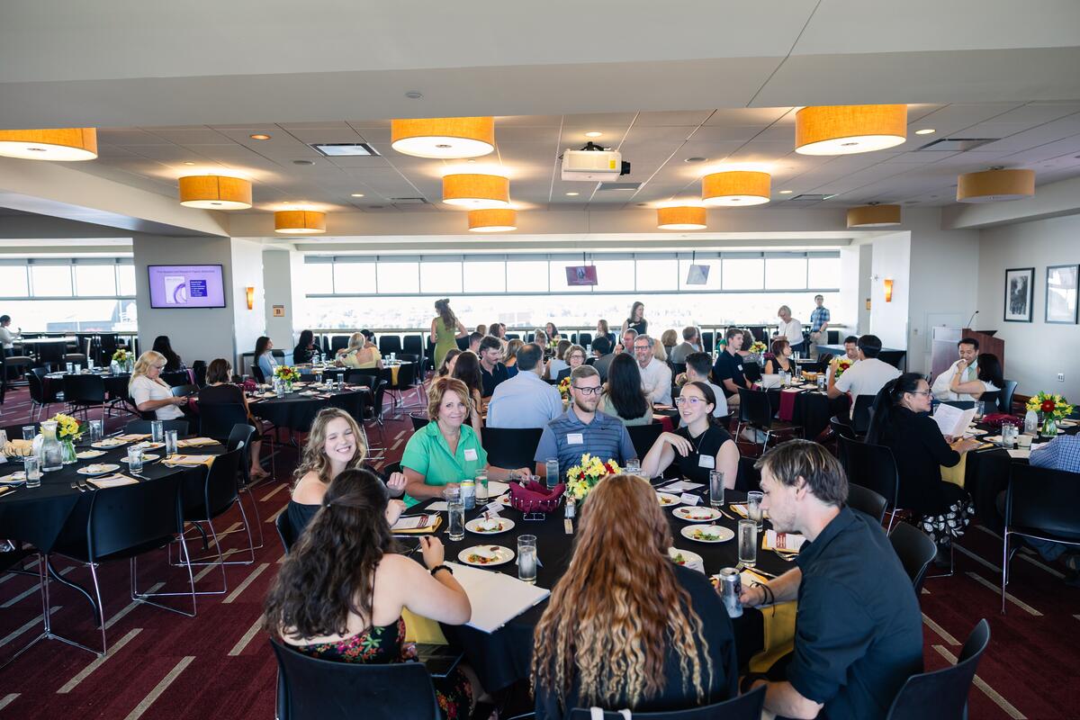 Dental Hygiene banquet attendees gather and enjoy dinner before the ceremony