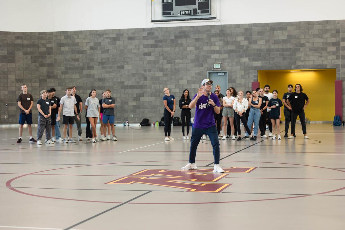 Playfair leader leads teambuilding exercises