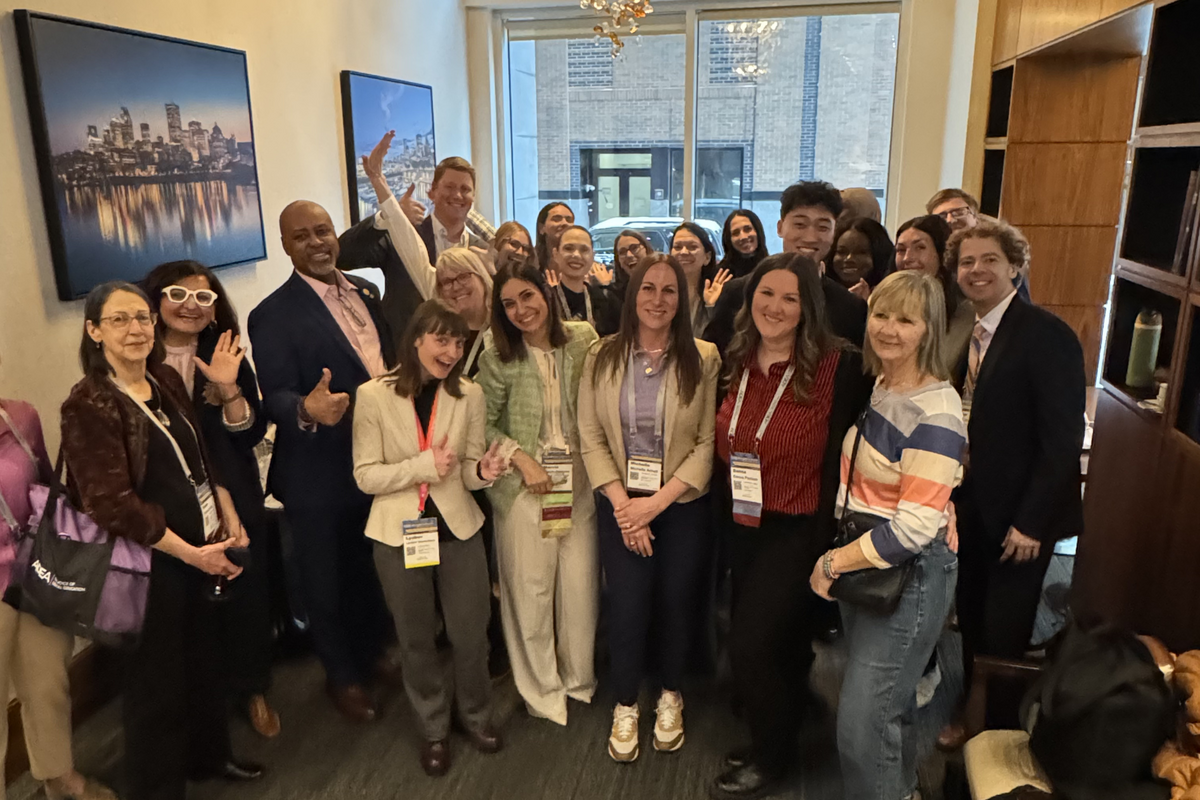 A large group of students, faculty and staff at ADEA
