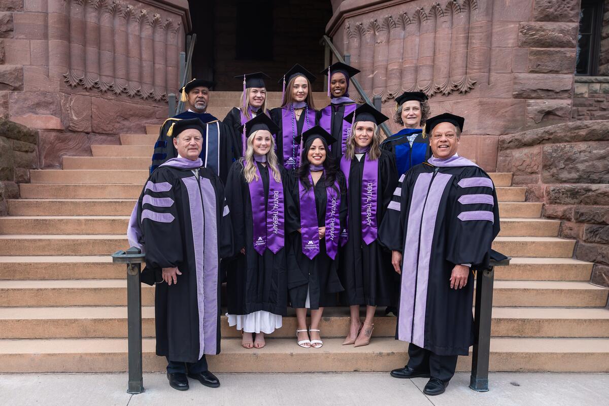 Dental Therapy Class of 2026 group shot in front of Pillsbury Hall