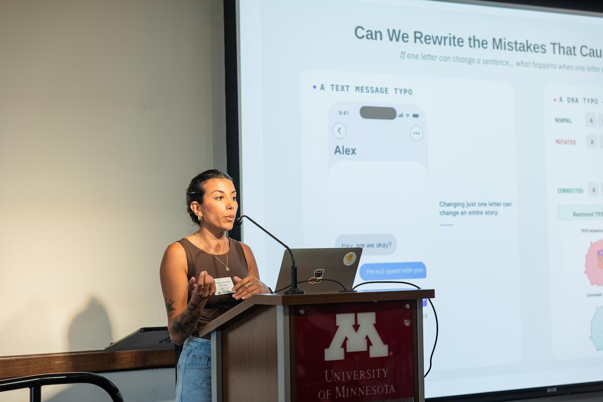 an oral biology student presents at a symposium