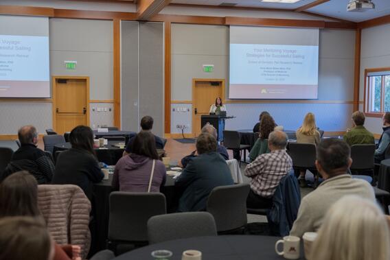 Anne Weber-Main presents to attendees on mentorship