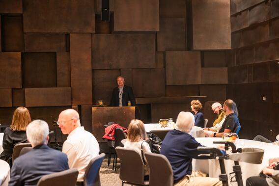 Brent Larson addresses the audience