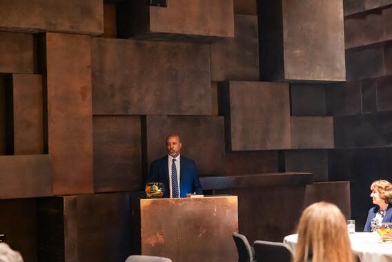 Dean Mays speaks at a podium