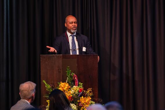 Dean Mays speaks at a podium