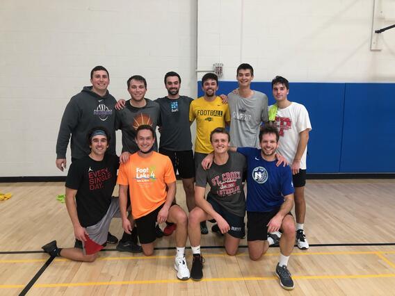 Cole Johnson and classmates on a basketball court