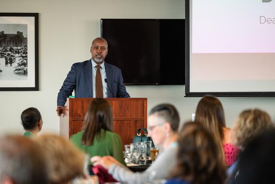 Dean Keith Mays speaks to the audience from a podium