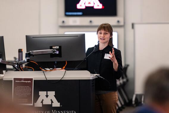 Lyubov Slashcheva, DDS, MS, speaks from a podium