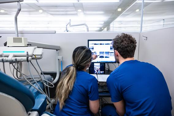 Two students observing xray.