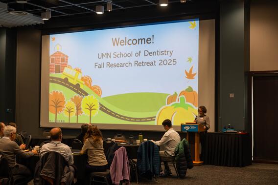 Artinger welcomes attendees to the Research Retreat