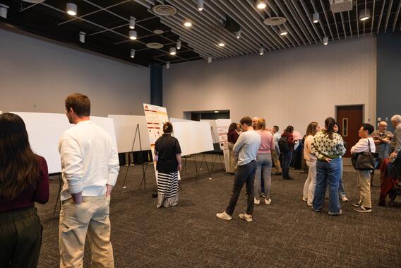 Participants visit research posters