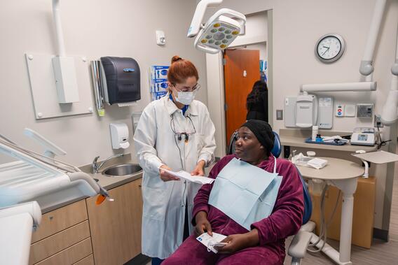 A student counsels a patient in an office at NorthPoint Health and Wellness