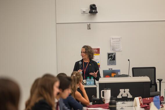Artinger addresses the students at orientation