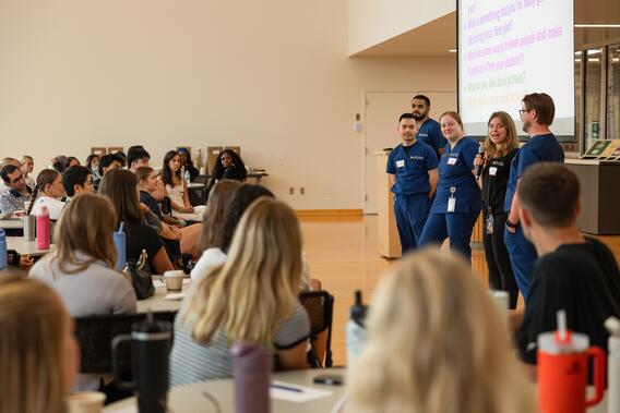 Current students present in a panel format to incoming students