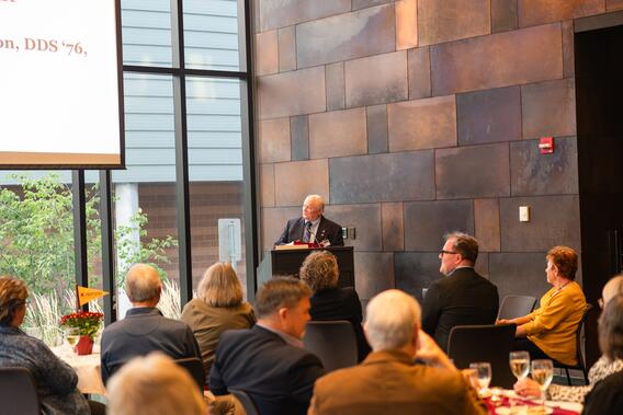 Larson shares remarks as the Distinguished Alumni Award winner