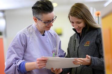Faculty and Student in clinic together