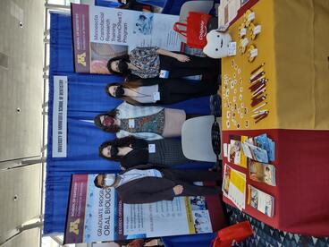 Students and faculty pose at AADOCR